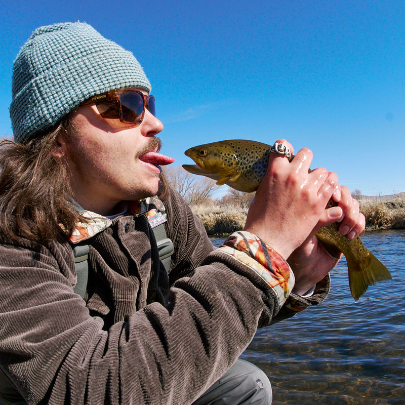 / Z87+ HDPV Polarized Brown | photo_of_person.jpg | Person wearing The Hawksbill Revlock with Z87+ HDPV Polarized Brown lens