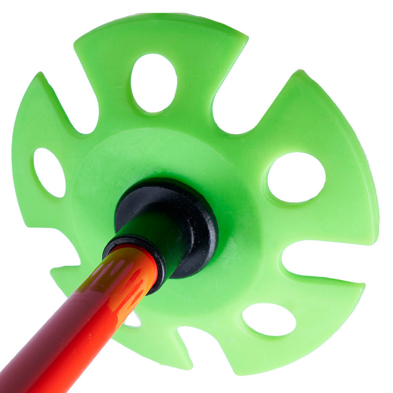 A bright green ski pole basket with circular cutouts, attached to a red and black pole, shown against a solid white background.