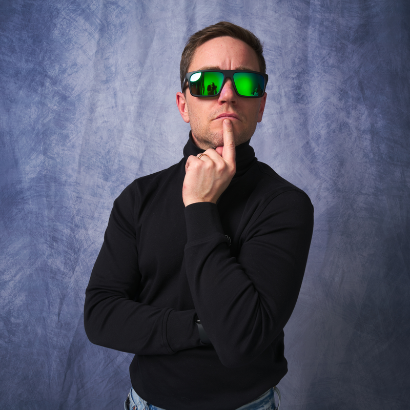 / HDPV Polarized Blue-Green | photo_of_person.JPG | Person wearing The Bio Exec Turboshaft with HDPV Polarized Blue-Green lens