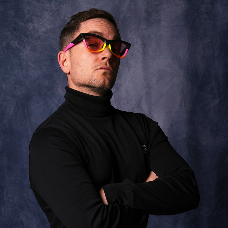 Photochromic Rose | photo_of_person_2.JPG | Front view of The Italo Clawdia with Photochromic Rose lens on white background
