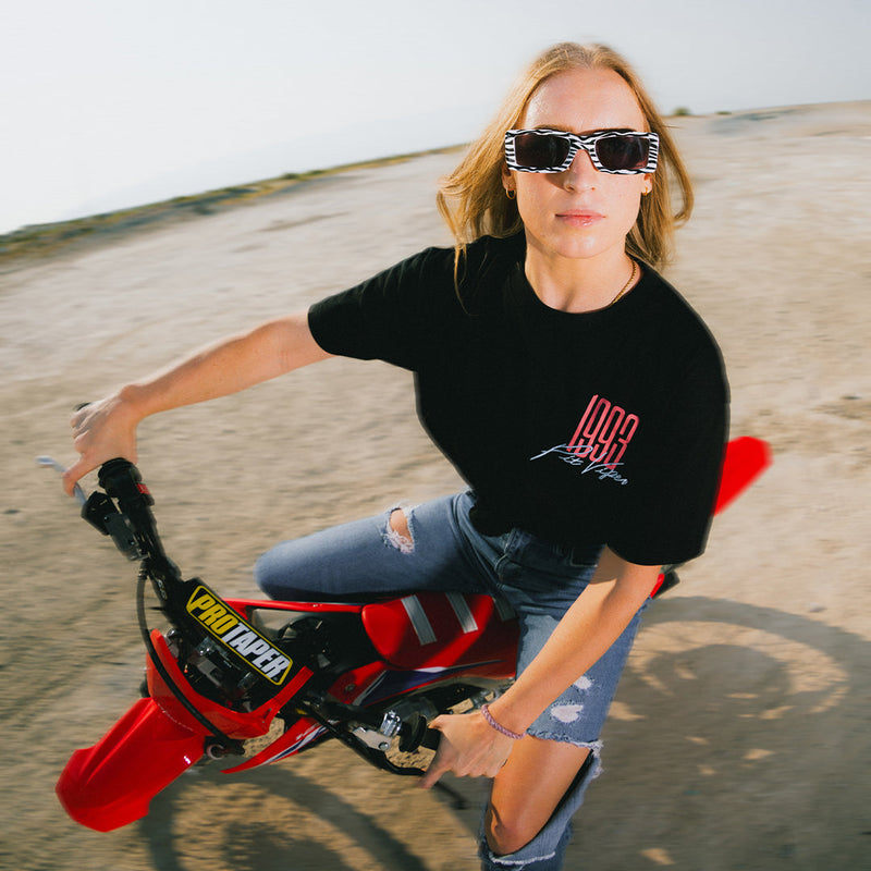  | photo_of_person.JPG | Person wearing The Herbivore Low Bones sunglasses