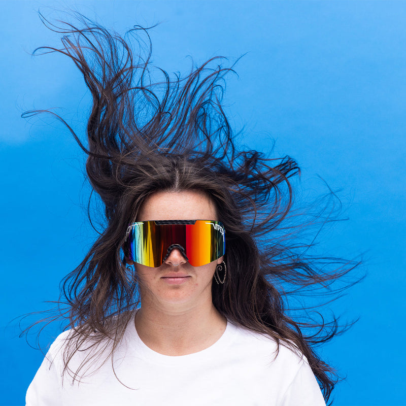  | photo_of_person_2.JPG | Person wearing The Lightweight Synthesizer sunglasses