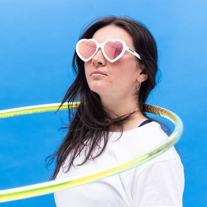 / Polarized Pink | photo_of_person.JPG | Person wearing The Miami Nights Admirer with polarized Pink lens
