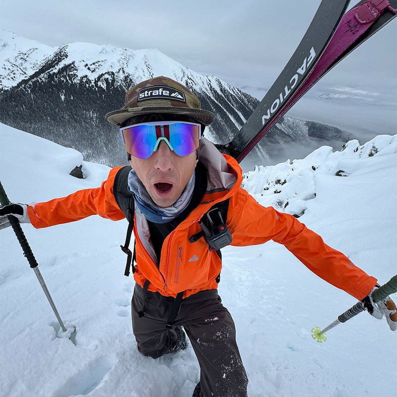 | photo_of_person_2.JPG | Person wearing The Moontower Try-Hard sunglasses