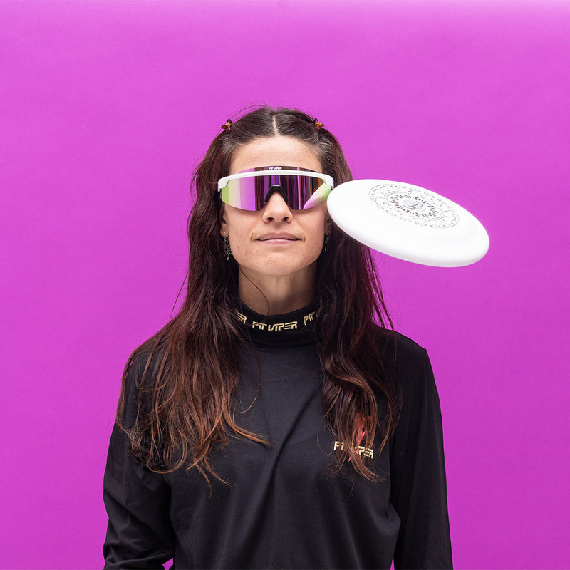 / Polarized Pink | photo_of_person.JPG | Person wearing The Miami Nights Skysurfer with polarized Pink lens