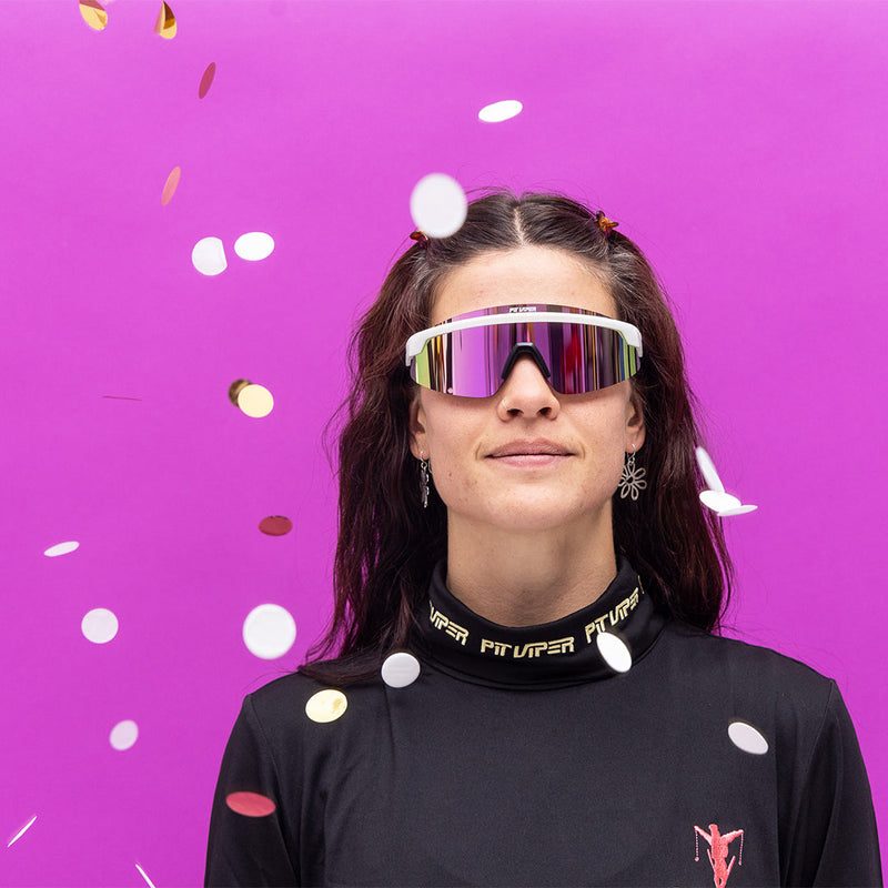 / Polarized Pink | photo_of_person.JPG | Person wearing The Miami Nights Skysurfer with polarized Pink lens