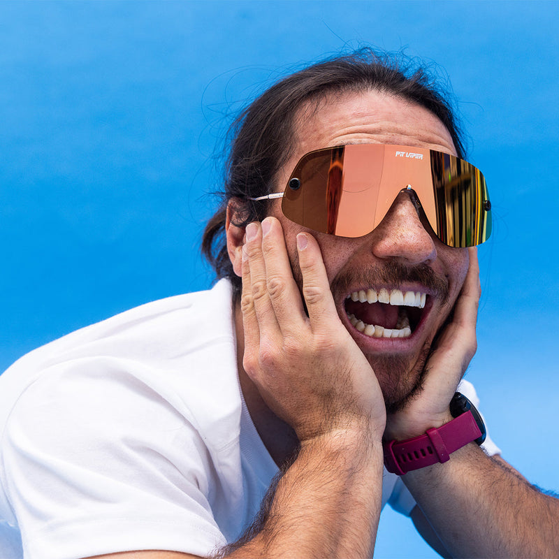/ Polarized Rose | photo_of_person.JPG | Person wearing The Rosé Limousine with polarized Rose lens